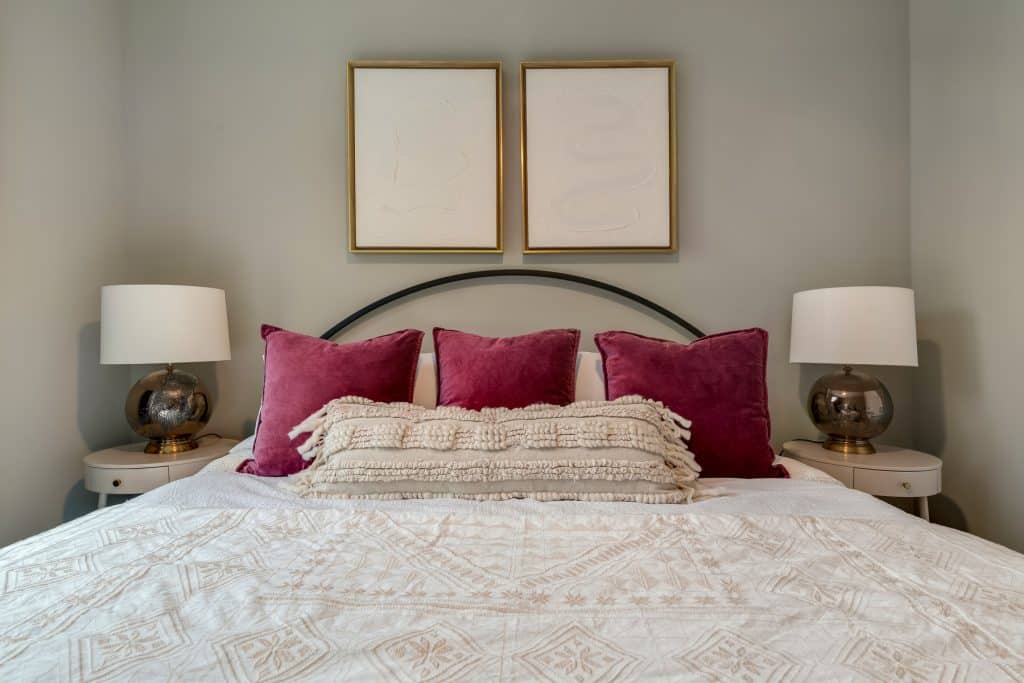 Chic bedroom decor in model apartment home at Margaux Midtown