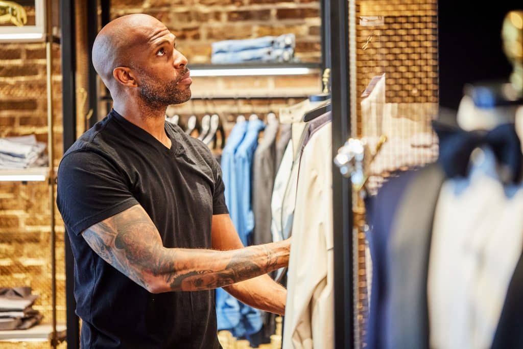 Lifestyle image of a man shopping in a store