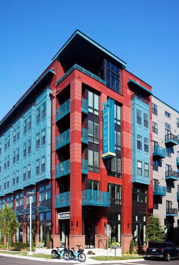 Exterior view of Margaux Midtown's apartment community and signage