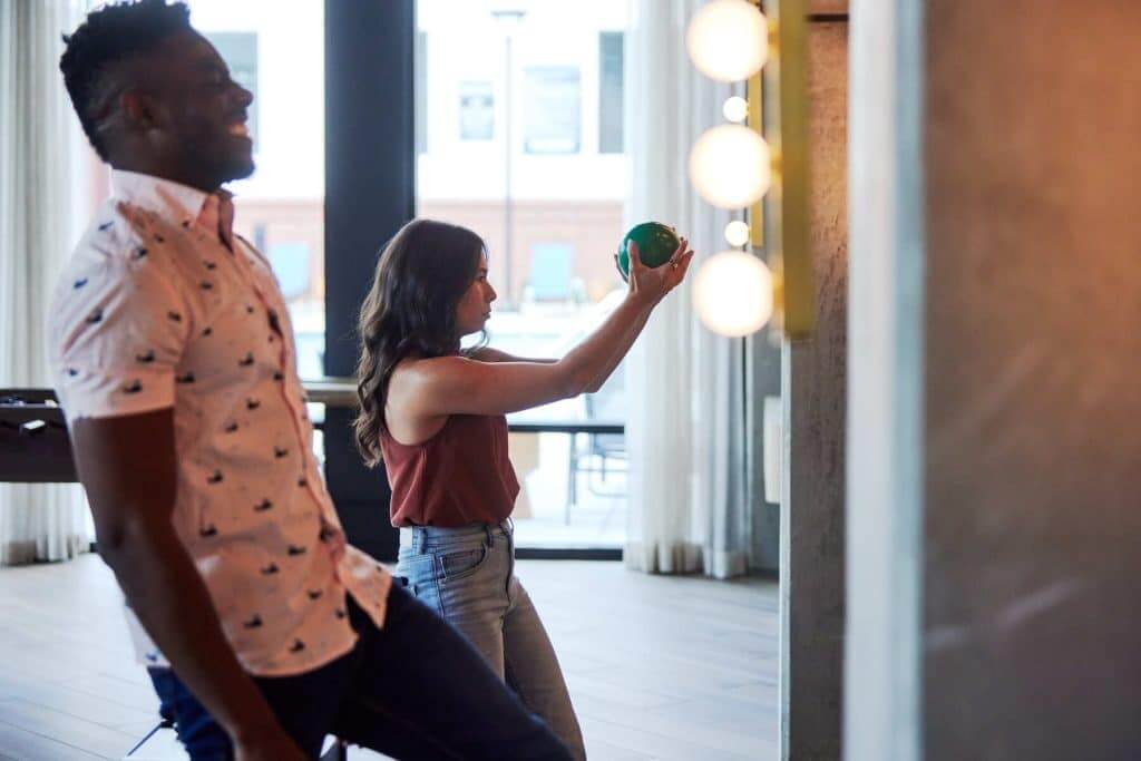 Margaux Midtown residents using community mini duck bowling