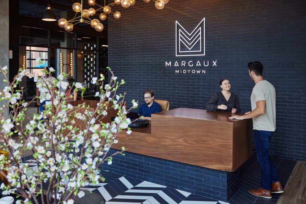 Margaux Midtown staff working at the front lobby desk