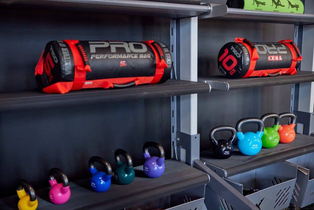 Free weights and dumbbells in Margaux Midtown's fitness center