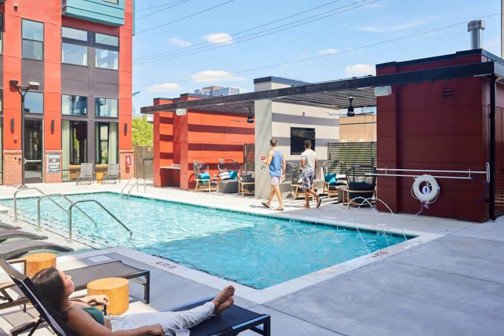 Residents enjoying Margaux Midtown's pool