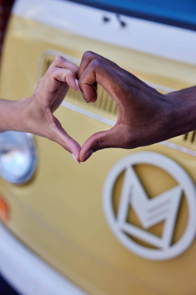 Margaux Midtown residents making a hand heart