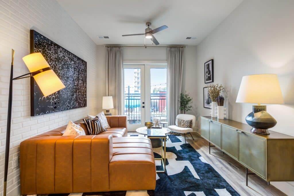 Furnished living room in apartment home at Margaux Midtown