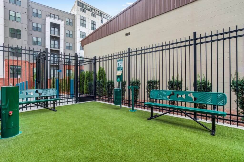 Benches inside Margaux Midtown's community dog park